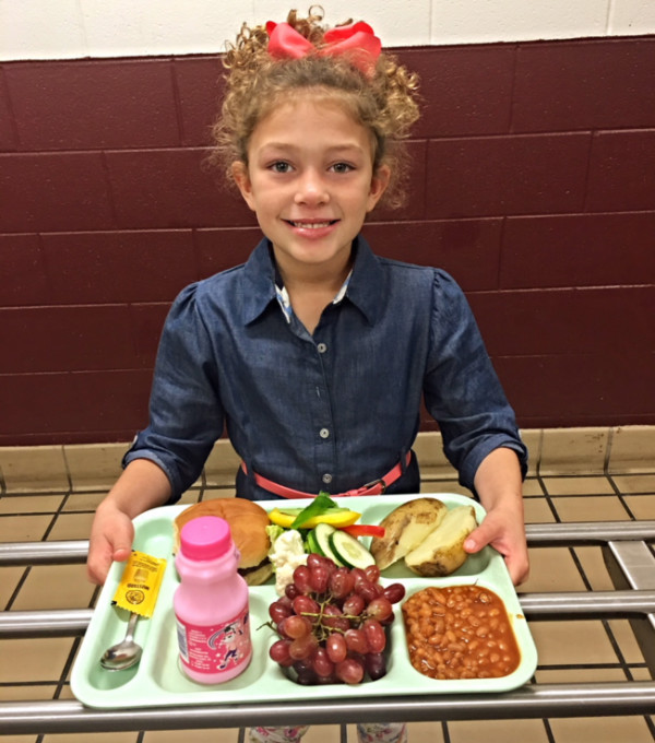 image of student with lunch